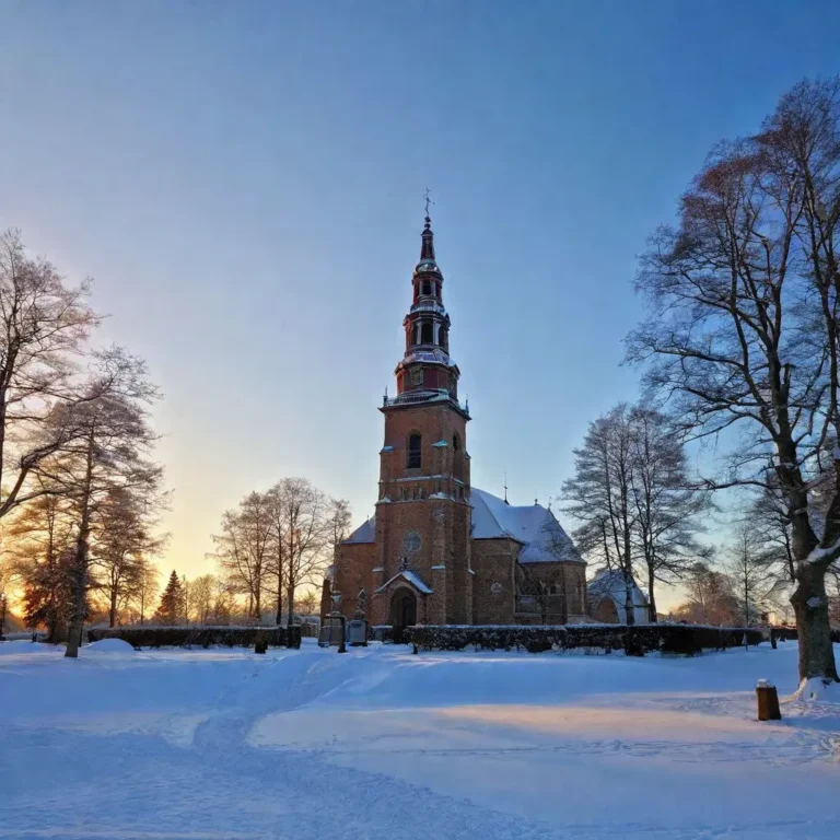 A serene winter scene depicting the observance of Trettondedag Jul in Sweden.